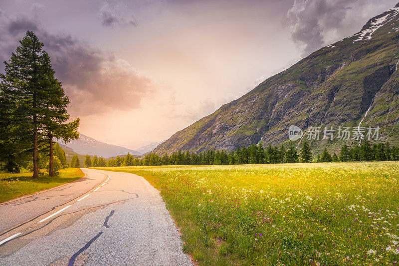 Mountain Road to Col de l'Iseran - Idyllic alpine landscape at springtime in Val d'Isère - French alps